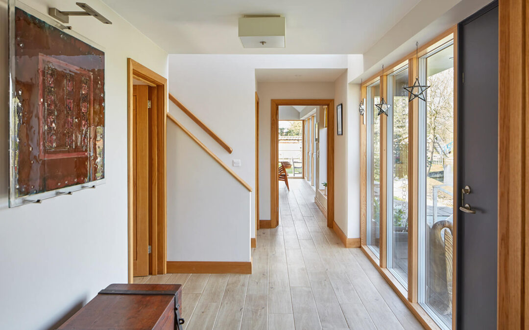 eco-new-build-entryway-with-wood-details-and-big-windows