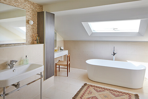 mid-century-modern-bathroom-with-free-standing-tub-and-rooflight